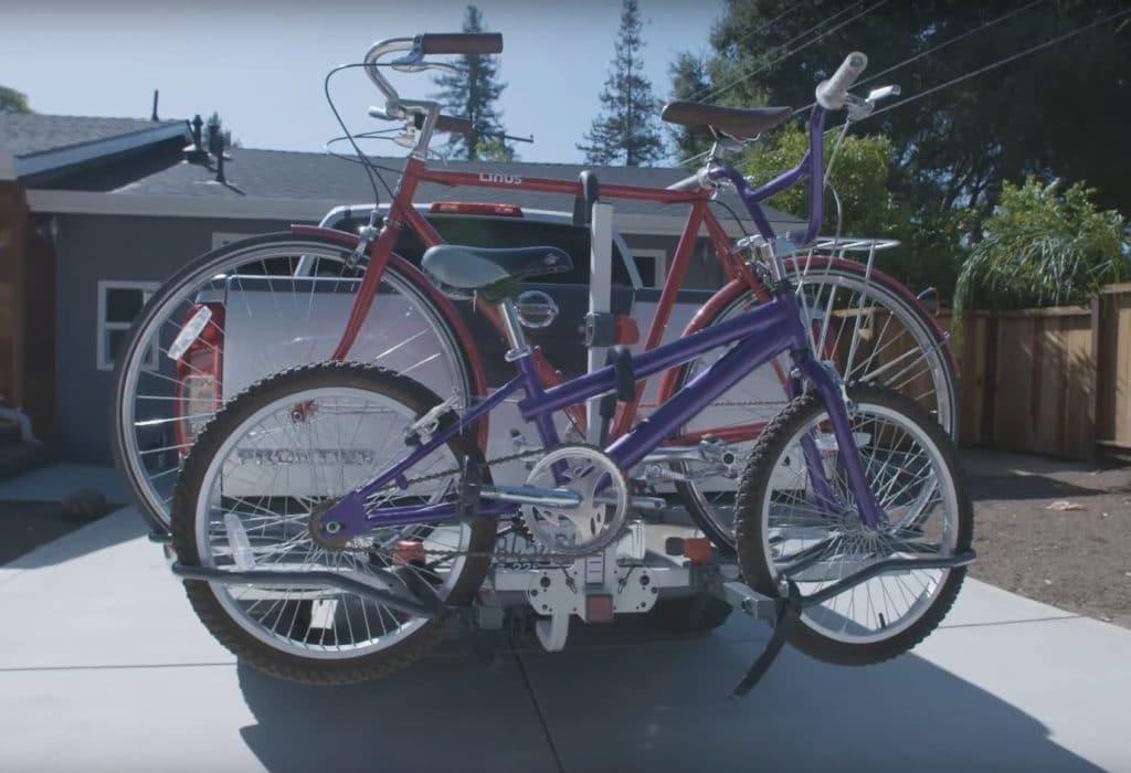 Bell Right Up 250 Hitch Rack with 2 bikes attached to white pickup truck