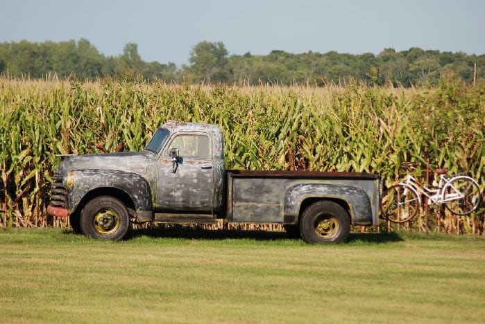 old chevy pickup truck with attached bikes