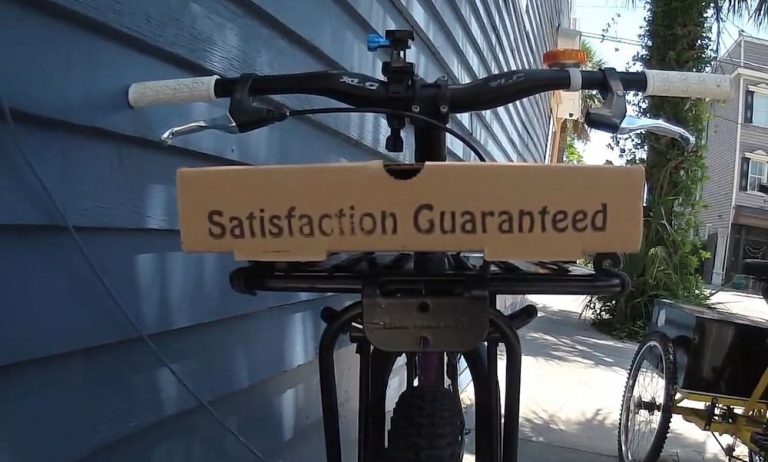 bicycle with pizza box on the the front rack