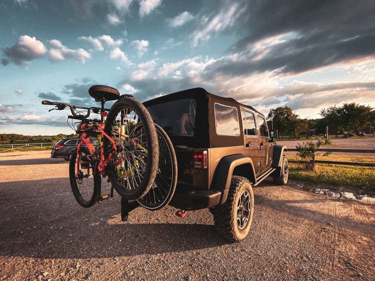 jeep rubicon with 2 bicycles on hanging hitch bike rack