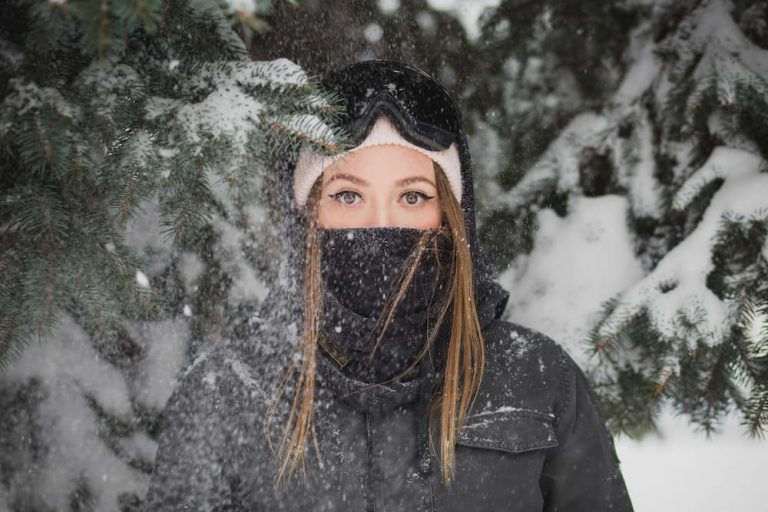 young female cyclist wearing black cycling neck gaiter