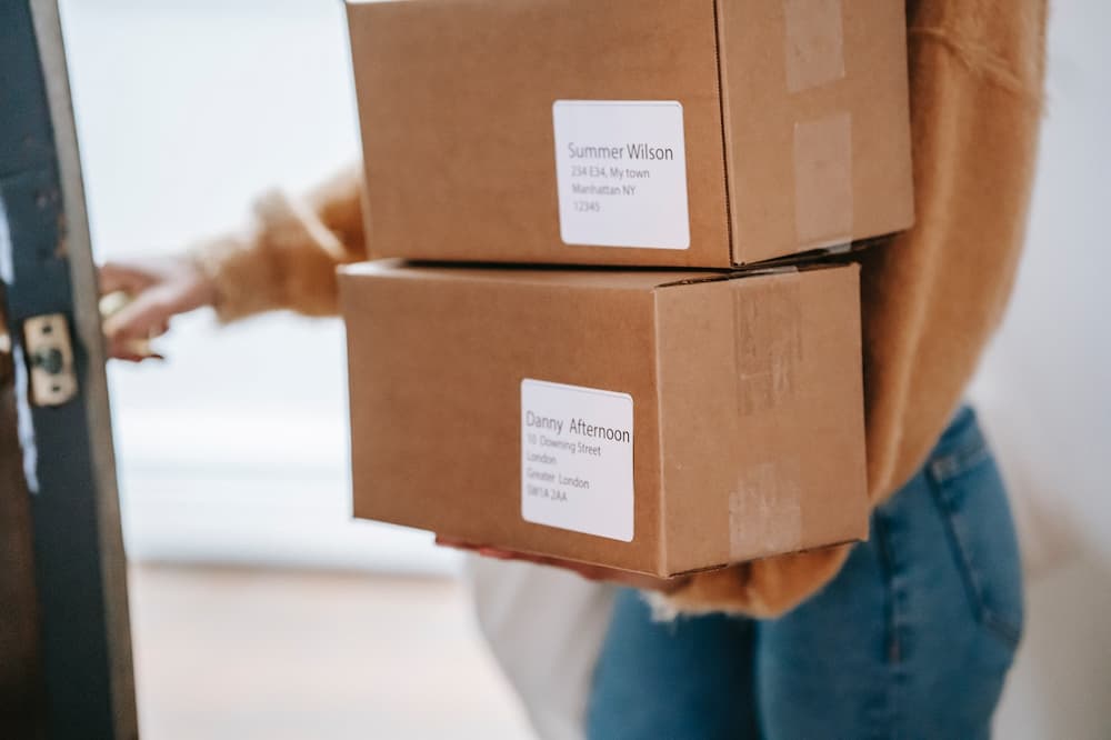 female cyclist delivering boxes