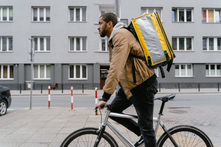 man on bicycle delivering food