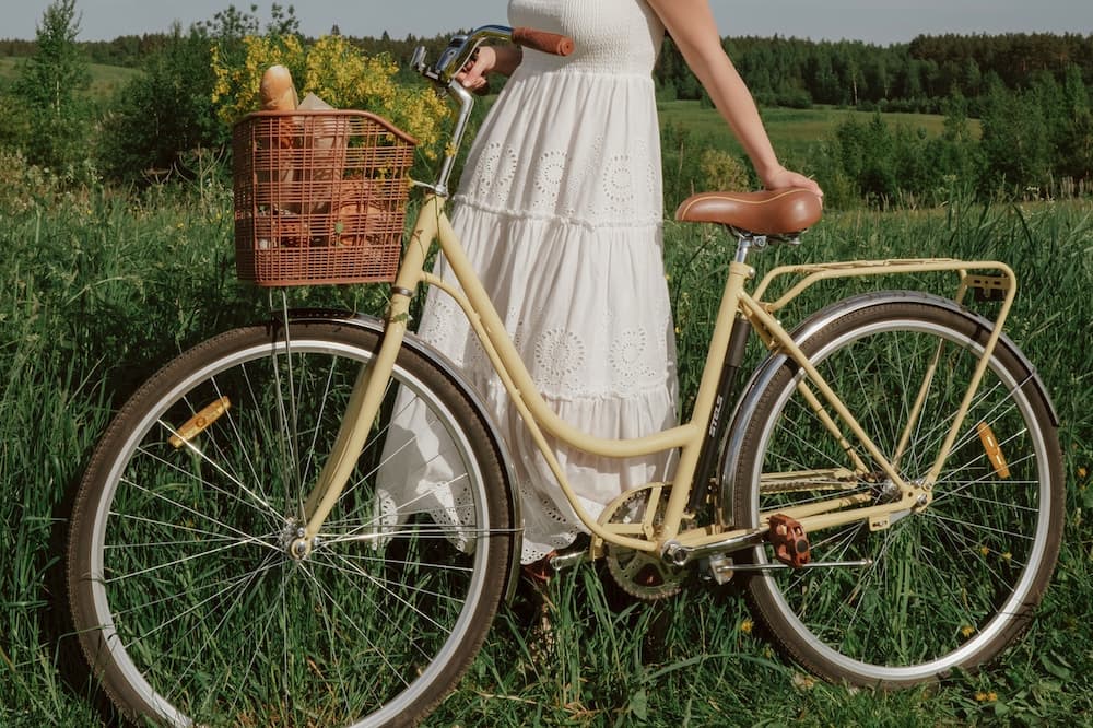 young female with women's step-thru bicycle