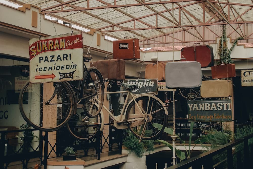 two bicycles hanging from ceiling